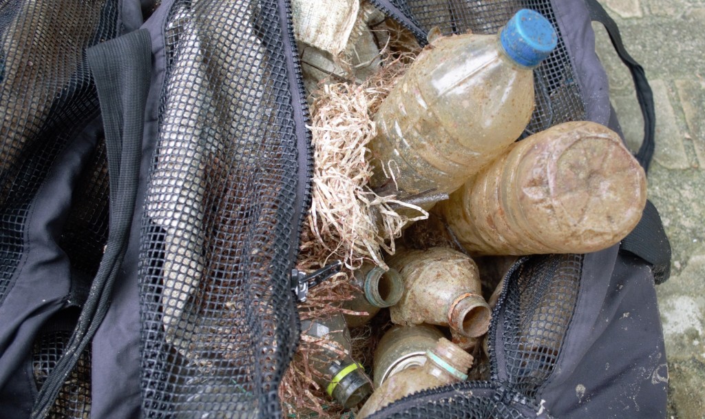 fins to spurs underwater clean up thailand bags of trash