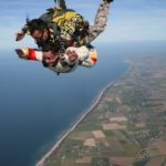 job abroad, fins to spurs, skydiving